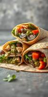 Fresh wraps filled with grilled chicken, vegetables, and vibrant sauces in a cozy setting perfect for a quick meal photo