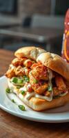 Delicious chicken sandwich piled high with flavorful ingredients served on a plate photo