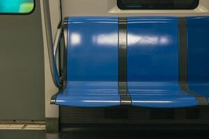 Empty subway or underground or metro seats. Public transportation photo