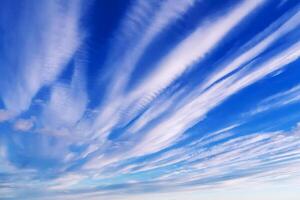 background of blue sky with white clouds in summer photo