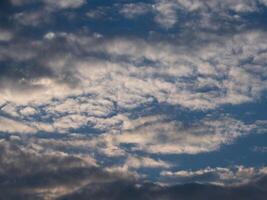 Blue sky with white clouds. Clear skies with scattered clouds on a sunny day. photo