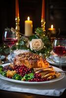 Elegant holiday dinner table setting with roasted meat, cranberries, and red wine photo