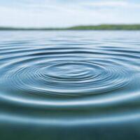 Serene lake with rippling water surface photo