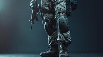 A soldier in full combat gear is ready for action. photo