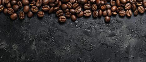 Coffee beans scattered on a dark background. photo