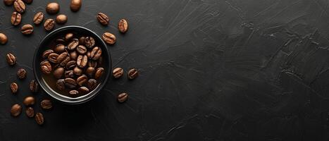 Coffee beans in a bowl on a dark background. photo