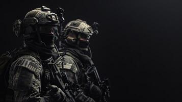 Two special forces soldiers in the shadows, armed with rifles photo