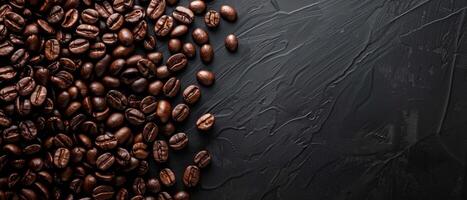 Coffee beans scattered on a dark background. photo