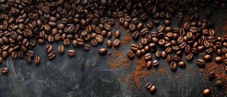 Coffee beans scattered on a dark background. photo