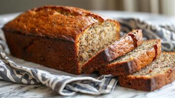 Freshly baked banana bread loaf sliced with moist and tender crumb, photography photo