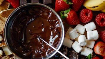 Luxurious chocolate fondue set with melted dark chocolate fruits marshmallows and biscuits for dipping, photo
