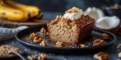 Rustic loaf of gluten-free banana bread with whipped coconut cream and chopped walnuts, picture photo
