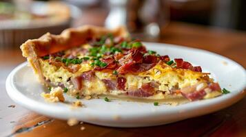 Quiche Lorraine with a golden flaky crust filled with bacon cheese and caramelized onions served on a white plate, photography photo