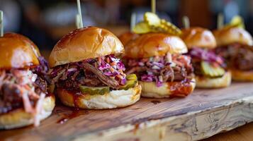 BBQ pork sliders topped with coleslaw and pickles lined up neatly on a rustic serving board, picture photo