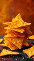 Cheddar cheese chunks and tortilla chips on dark orange gradient background, photorealistic photo