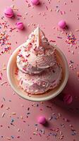 Top-down view of empty pastel pink table with scattered ice cream sprinkles, picture photo