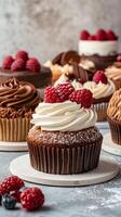 Various cakes with a plain light background and copy space, photo