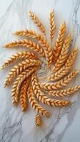 Wheat spikelets arranged in a circular pattern on a tabletop, photography photo
