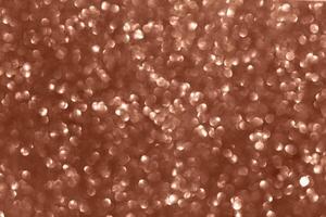 Mocha brown sequins background. Perfect texture for your design. Demonstrating color of 2025 year photo