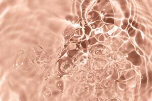 Sun glare, big bubbles on water. Mocha brown textured background. Close-up, selective focus, defocus. Demonstrating color of 2025 year photo