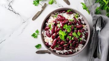 Red beans and rice in a bowl on a white background photo