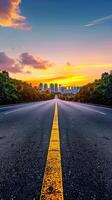 A long empty road with a yellow line on it photo