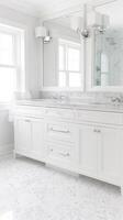 A white bathroom with marble flooring and white cabinets photo