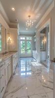 A large bathroom with marble floors and white cabinets photo