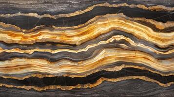 A large piece of marble with gold and black stripes photo