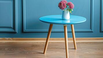 A table with a vase of flowers on it photo