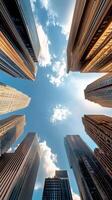 A view up at tall buildings in a city photo