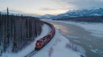 A train traveling through the snowy mountains photo
