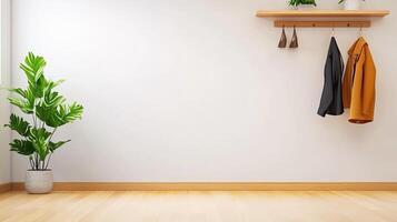 An empty room with a coat rack and a plant photo