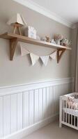 A baby's room with a crib, a shelf and a white wall photo