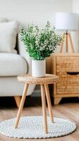 A white table with a plant on it photo