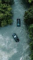 Two cars are submerged in a river photo