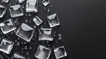 Ice cubes on a black background photo