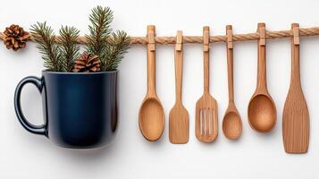 Wooden utensils and a mug with pine cones photo