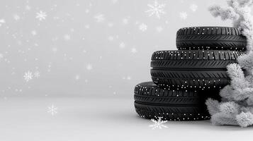 A stack of tires and a christmas tree photo