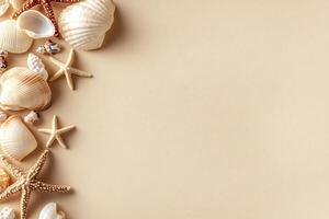 Shells and starfish on a beige background photo