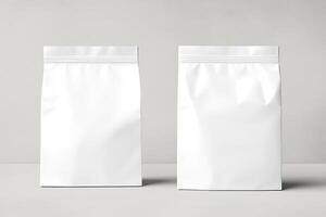 Two white paper bags on a table photo