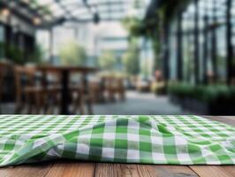 Tablecloth on wooden table with blurred background photo