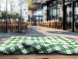 Tablecloth on wooden table with blurred background photo