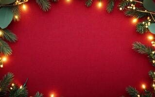 Christmas wreath on red background with christmas lights photo