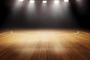 An empty basketball court with lights shining on it photo