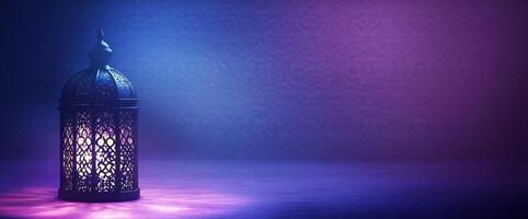 Islamic lantern on dark background with purple light photo