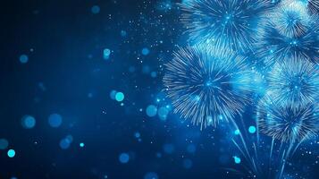 Fireworks on blue background with bokeh photo