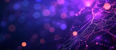 A spider web on a dark background with lights photo