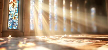 A room with a large stained glass window and sunlight shining through photo