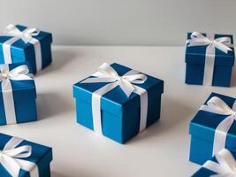 A blue box with a bow on it is surrounded by other blue boxes with bows on them. photo